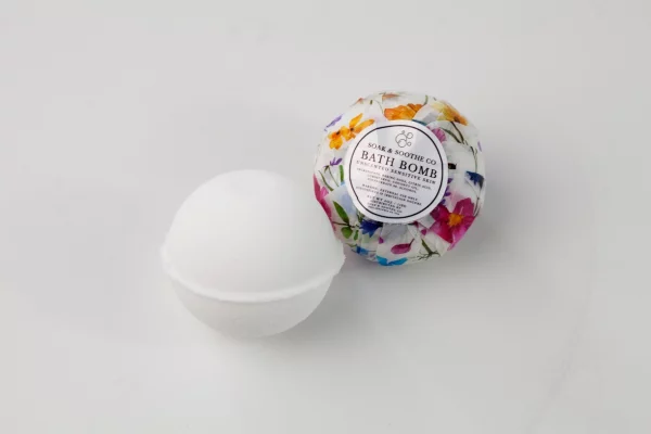 bath bomb wrapped next to unwrapped